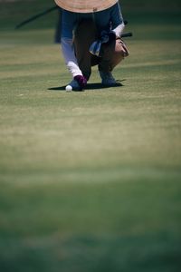 Low section of man on golf course