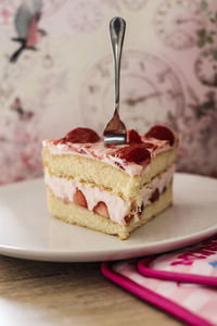 Close-up of cake in plate on table