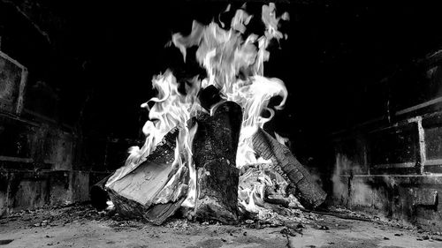 Panoramic view of abandoned fire at night