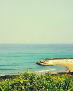 Scenic view of sea against clear sky