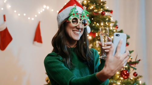 Girl makes christmas greeting video call