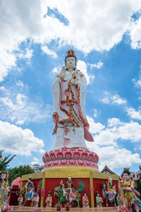 Low angle view of statue against sky