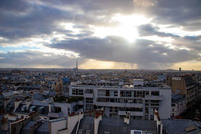 High angle view of buildings in city against sky