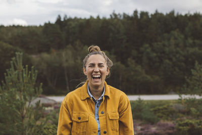 Happy woman looking at camera