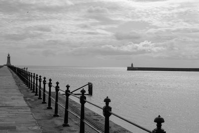 Pier on sea against sky