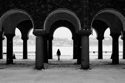 Man walking in corridor