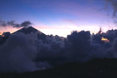 Scenic view of mountains against sky during sunset