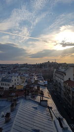 High angle view of buildings against sky during sunset