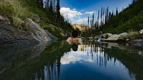 Reflection of trees in lake