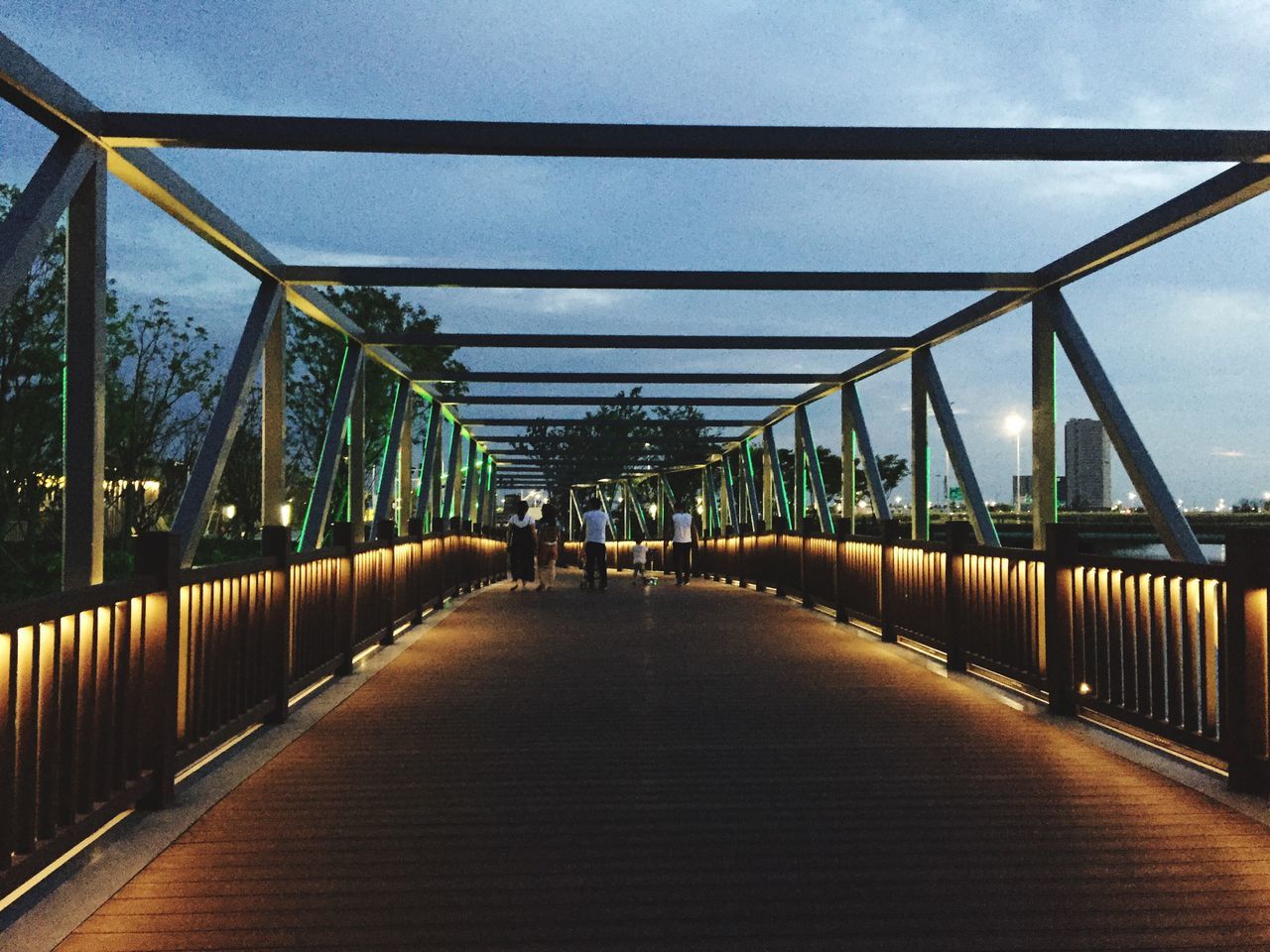 bridge - man made structure, the way forward, connection, built structure, architecture, real people, walking, transportation, sky, day, footbridge, outdoors, two people, women, men, city, people