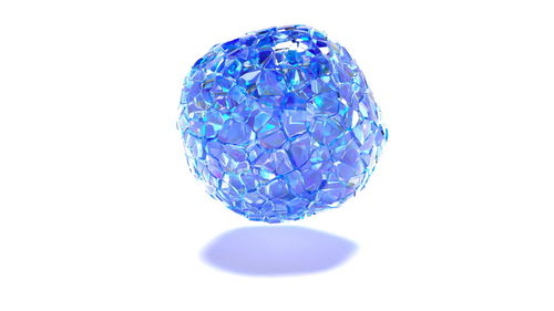 Close-up of blue ball against white background