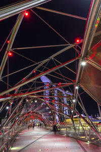 Illuminated ferris wheel at night