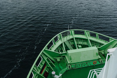 High angle view of boat sailing in sea