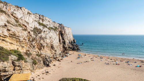 Scenic view of beach against clear sky