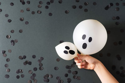 Close-up of hand holding crystal ball