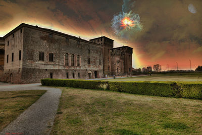 View of historic building at sunset