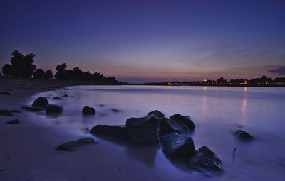 Scenic view of sea against sky at sunset