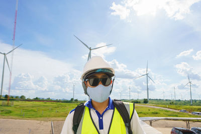Engineers male checking wind turbines. renewable energy technology 