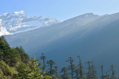 Scenic view of mountains against sky during winter