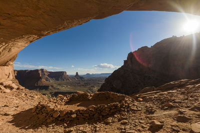 Panoramic view of rock formations against sky