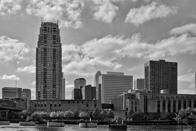 Skyscrapers in city against sky