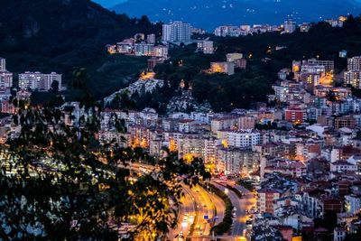 High angle view of illuminated buildings at night