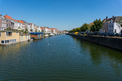 View of canal with buildings in background