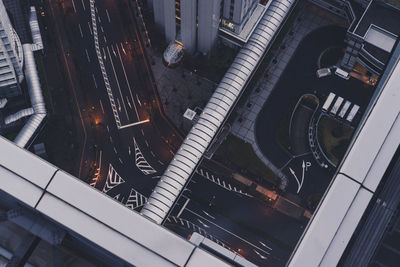 High angle view of illuminated factory in city