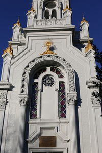 Low angle view of ornate building against sky