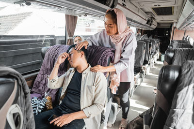 Low angle view of business people working at airport