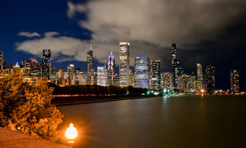 Illuminated buildings in city at night