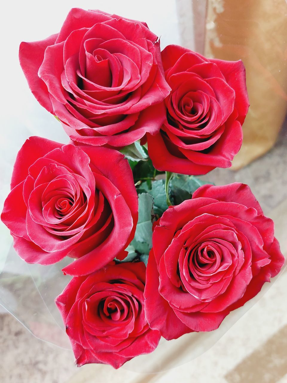 rose, flower, pink, flowering plant, red, plant, beauty in nature, nature, freshness, garden roses, bouquet, flower arrangement, petal, flower head, fragility, close-up, cut flowers, love, inflorescence, no people, valentine's day, emotion, positive emotion, celebration, arrangement, bunch of flowers, high angle view, outdoors