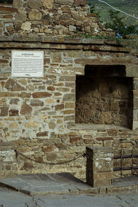 Graffiti on old building wall