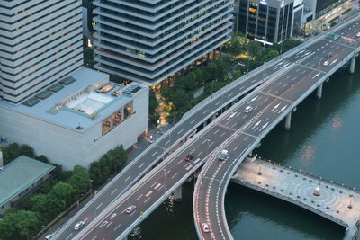 High angle view of street amidst buildings in city