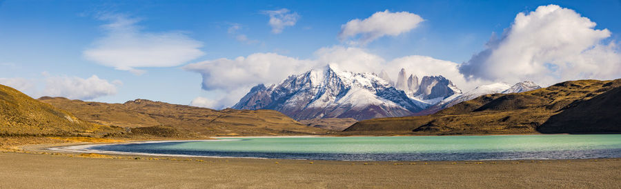 Widescreen panorama with rock towers in the torres del paine mountain massif, chile