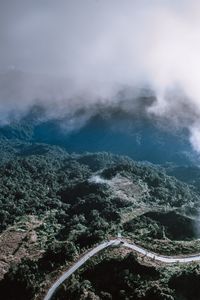 Aerial view of mountains in foggy weather