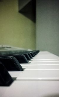 Close-up of piano keys at home