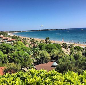 View of sea against clear blue sky