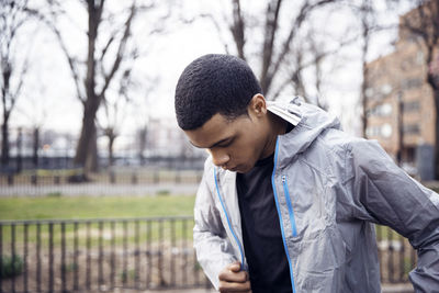 Male athlete walking at park