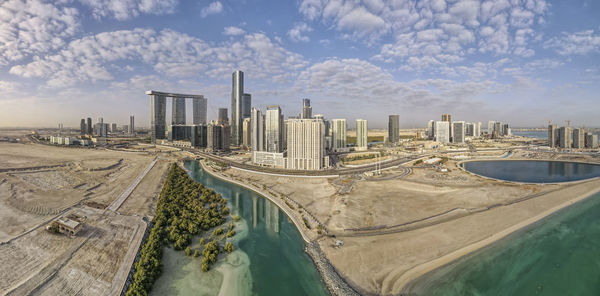 Aerial view on developing part of al reem island in abu dhabi on a cloudy day