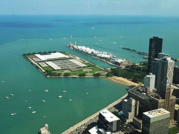 High angle view of cityscape by sea