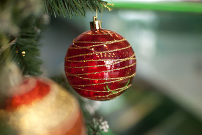 Close-up of christmas decoration hanging on tree