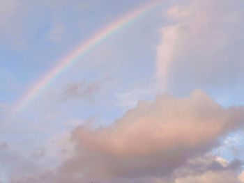 Low angle view of rainbow against sky