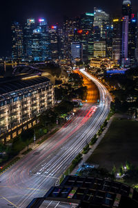 High angle view of illuminated city street at night