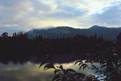 Scenic view of lake against sky during sunset