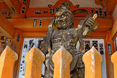 Low angle view of buddha statue