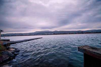 Scenic view of sea against cloudy sky