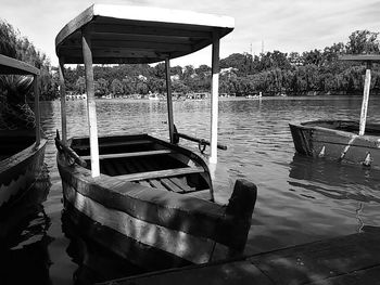 Boats in calm lake