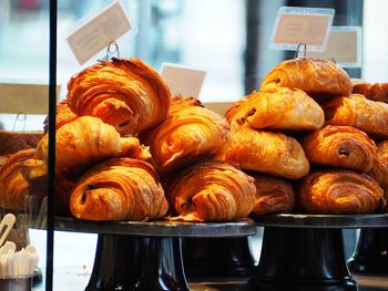 Close-up of chocolate croissants for sale in store 