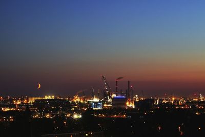 Illuminated cityscape at night